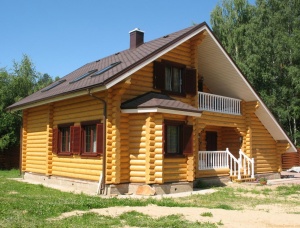 Rounded log house